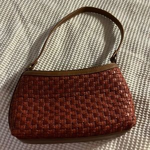 Fossil woven hand bag